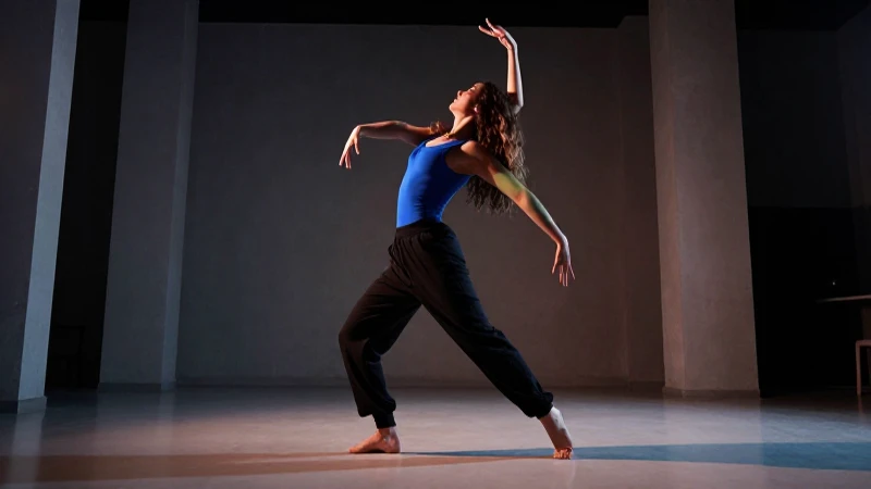 Bailarina moderna en estudio con iluminación dramática